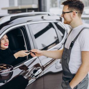 mechanic with client car service station